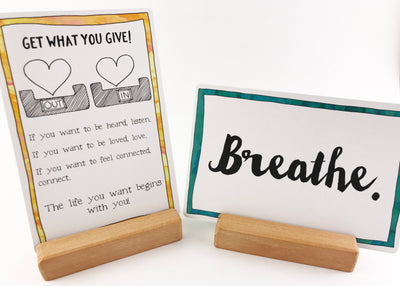 An example of a couple of the inspirational cards in the Personal Pep Talk strategy card decks in handcrafted wood display blocks